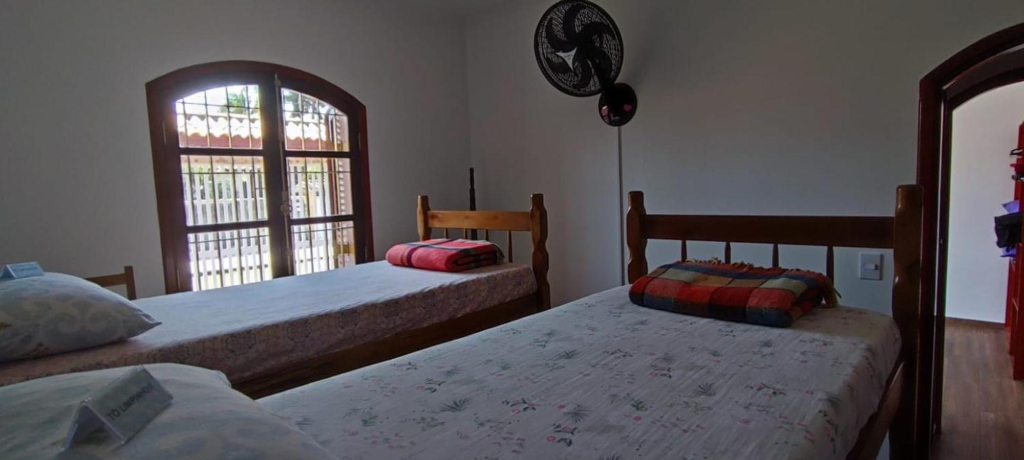Casa Rosa de Peruíbe - Casa de Temporada 3 dormitórios, 10 hóspedes, piscina, wi-fi, netflix, 800 metros da praia Exterior foto